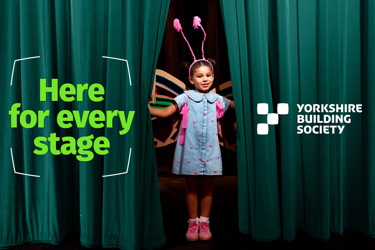 Girl peering through theatre curtains, with caption that says 'Here for every stage' and Yorkshire Building Society logo 