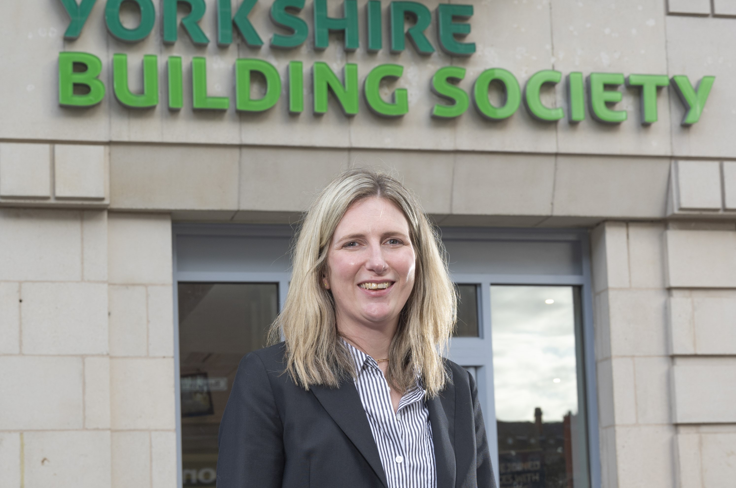 Laura Newton, a trustee of Yorkshire Building Society Charitable Foundation outside a branch of Yorkshire Building Society. 