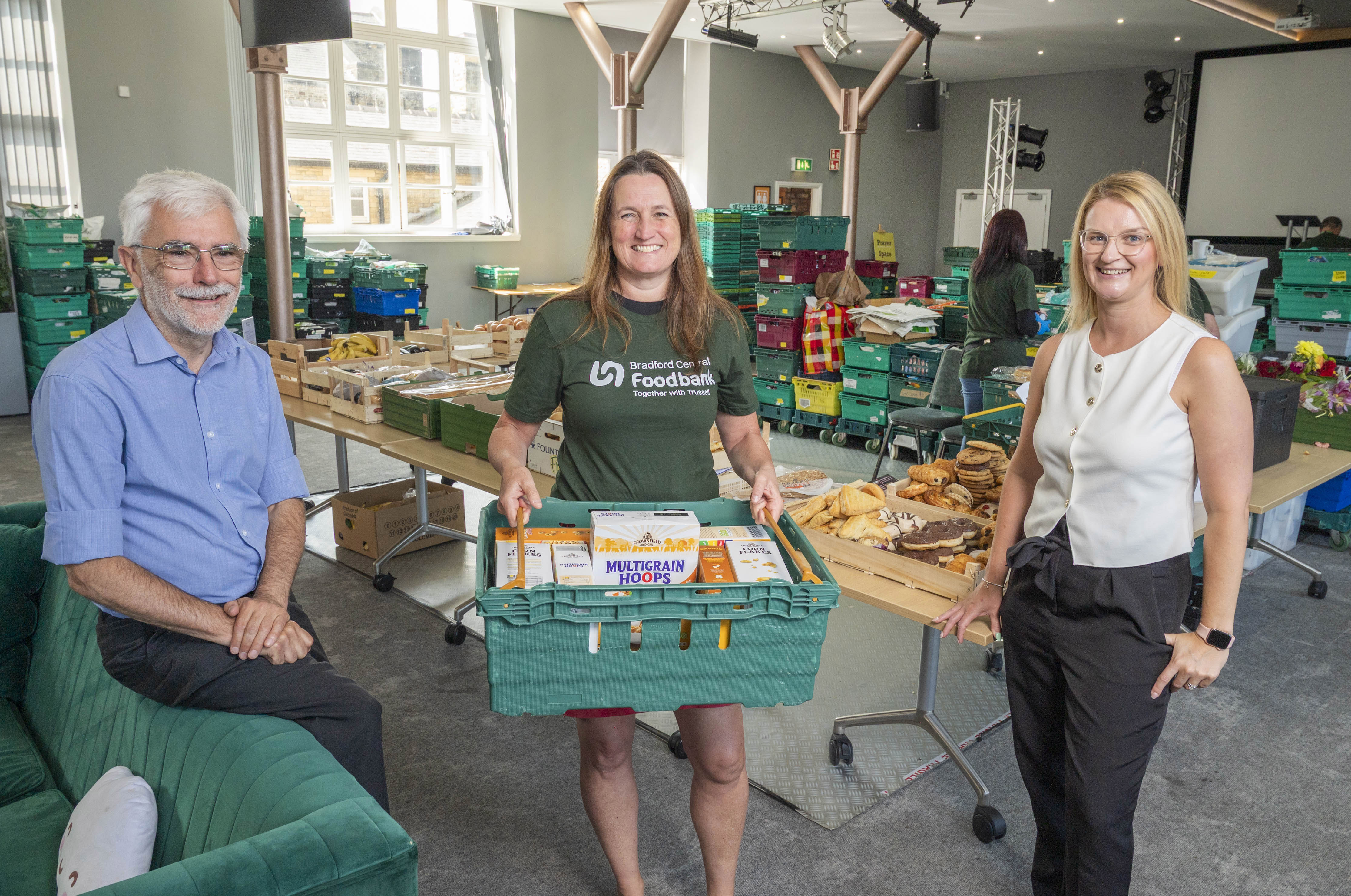 Neil Irving and Linzi Morgan, trustees of Yorkshire Building Society Charitable Foundation with Josie Barlow from Bradford Central Foodbank 