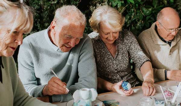 older adults doing crafts